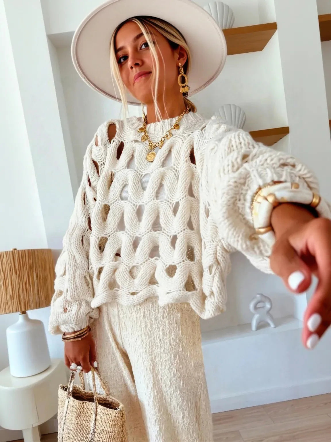 Lace-knit long-sleeve sweater