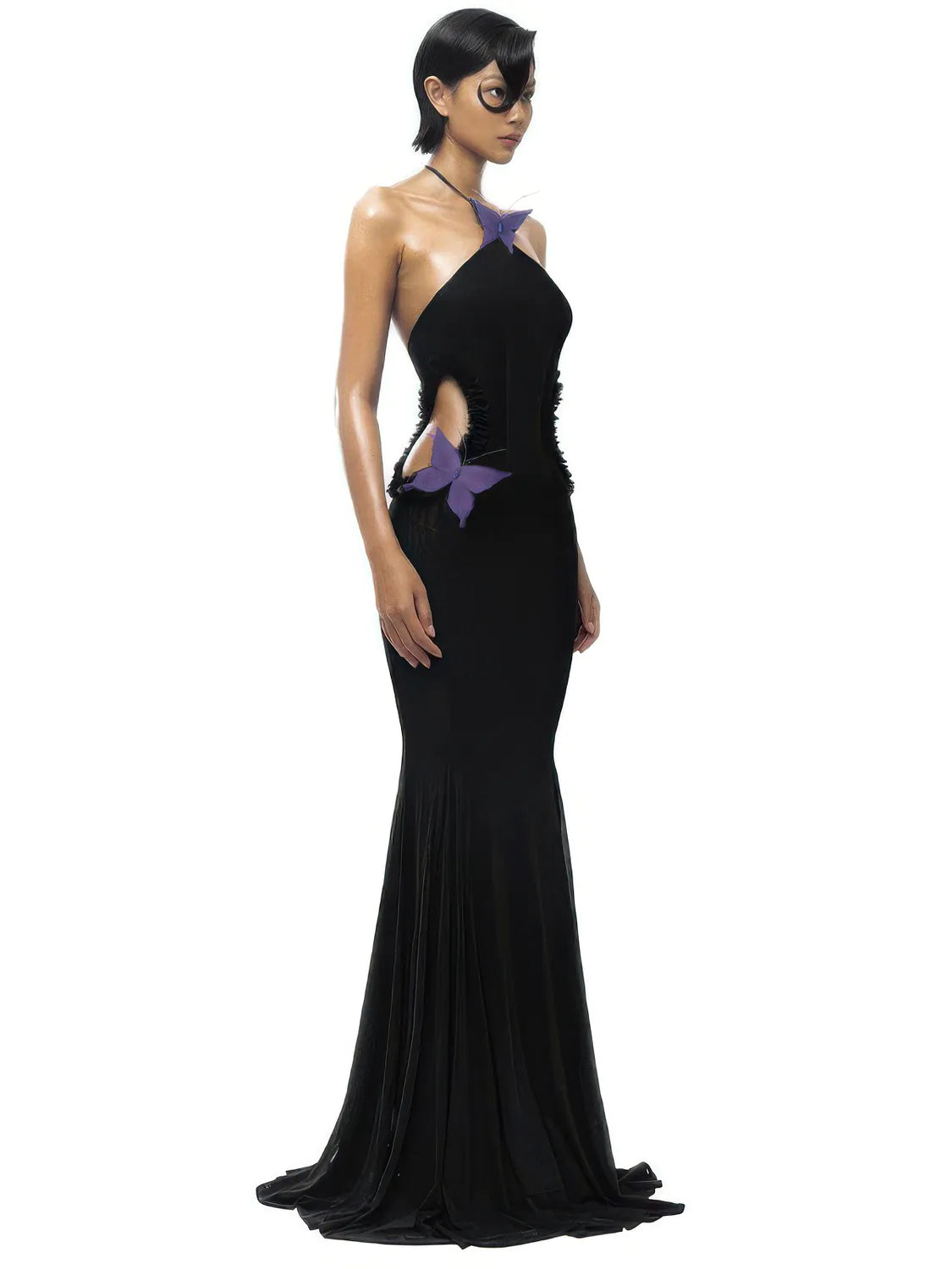 Black evening gown with a purple butterfly detail on a white background. #Color_Black