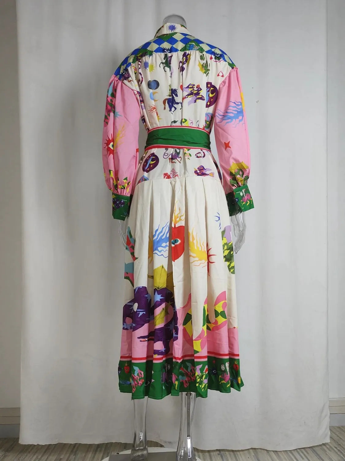 Colorful dress on a mannequin against a white curtain background. #Color_Violet