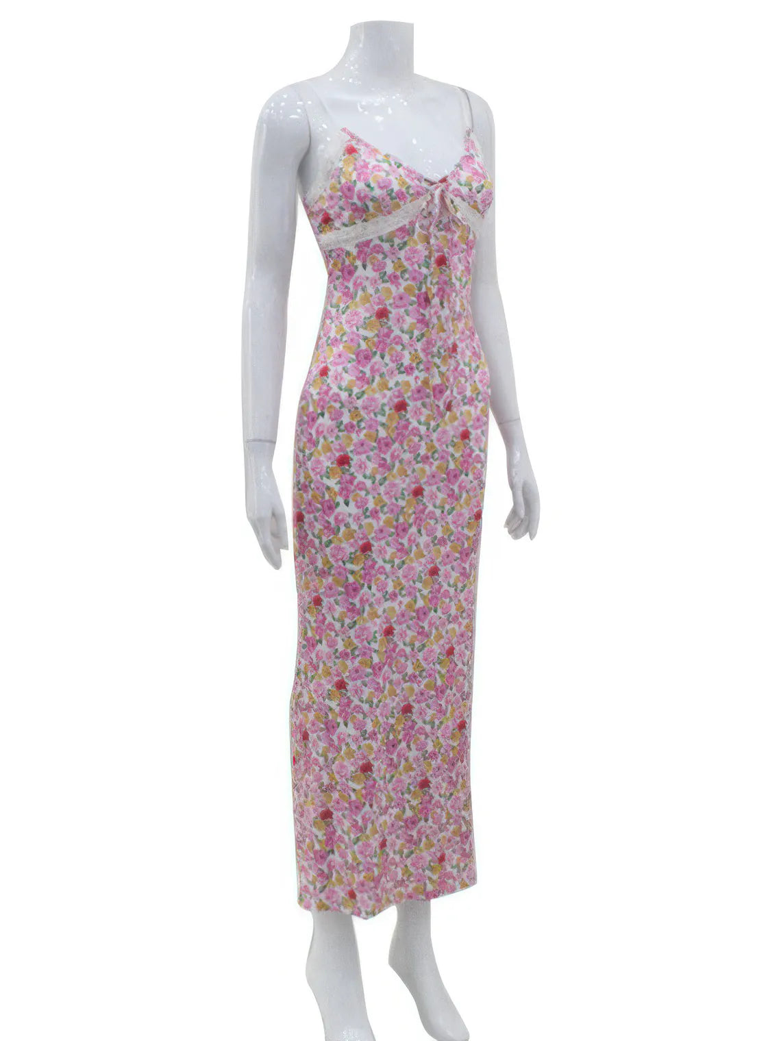 Floral dress on a mannequin against a white background | IFAUN