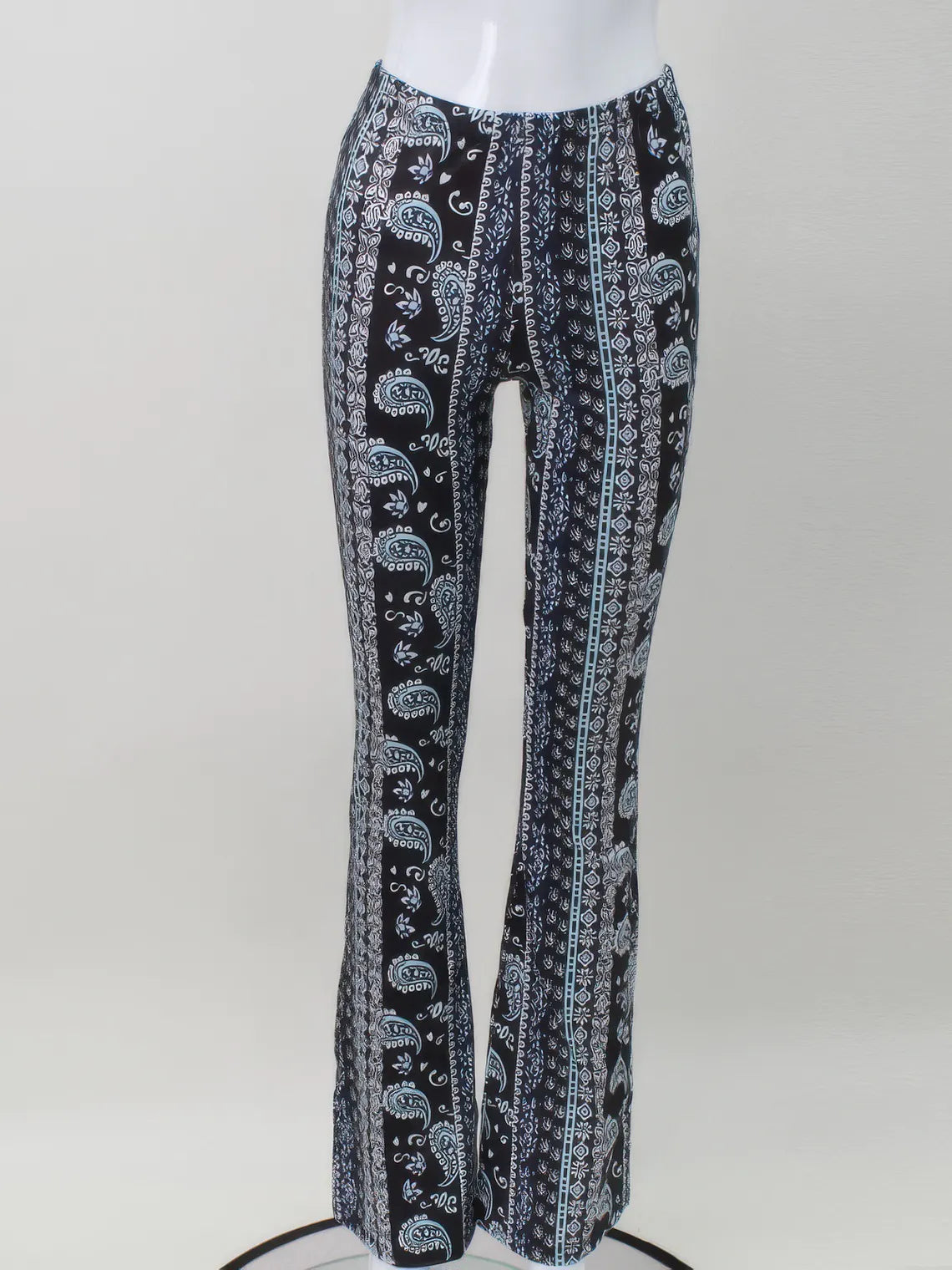 Black and white patterned pants on a white background. #Color_Black