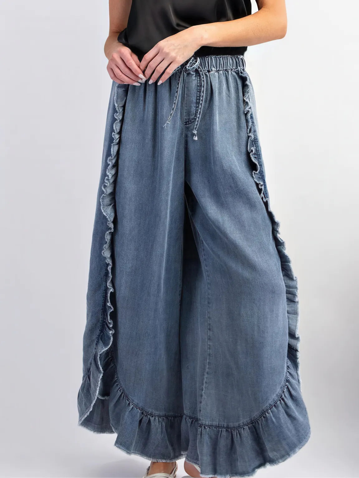 Denim ruffled fur-edged flared trousers