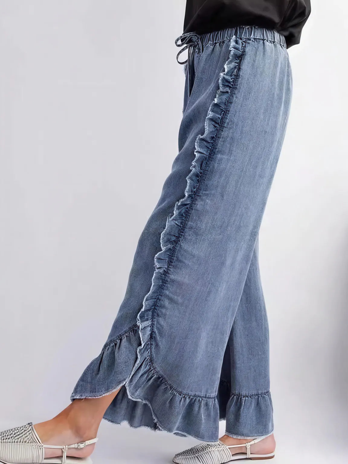 Denim ruffled fur-edged flared trousers