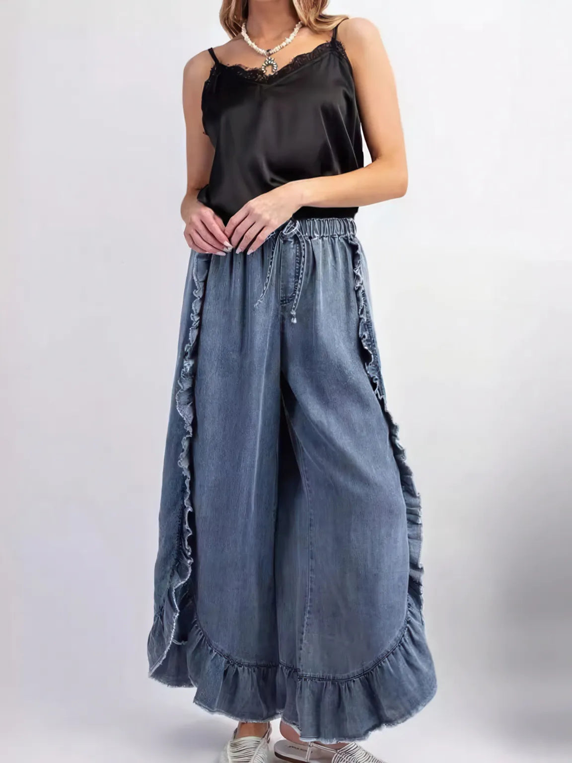 Denim ruffled fur-edged flared trousers
