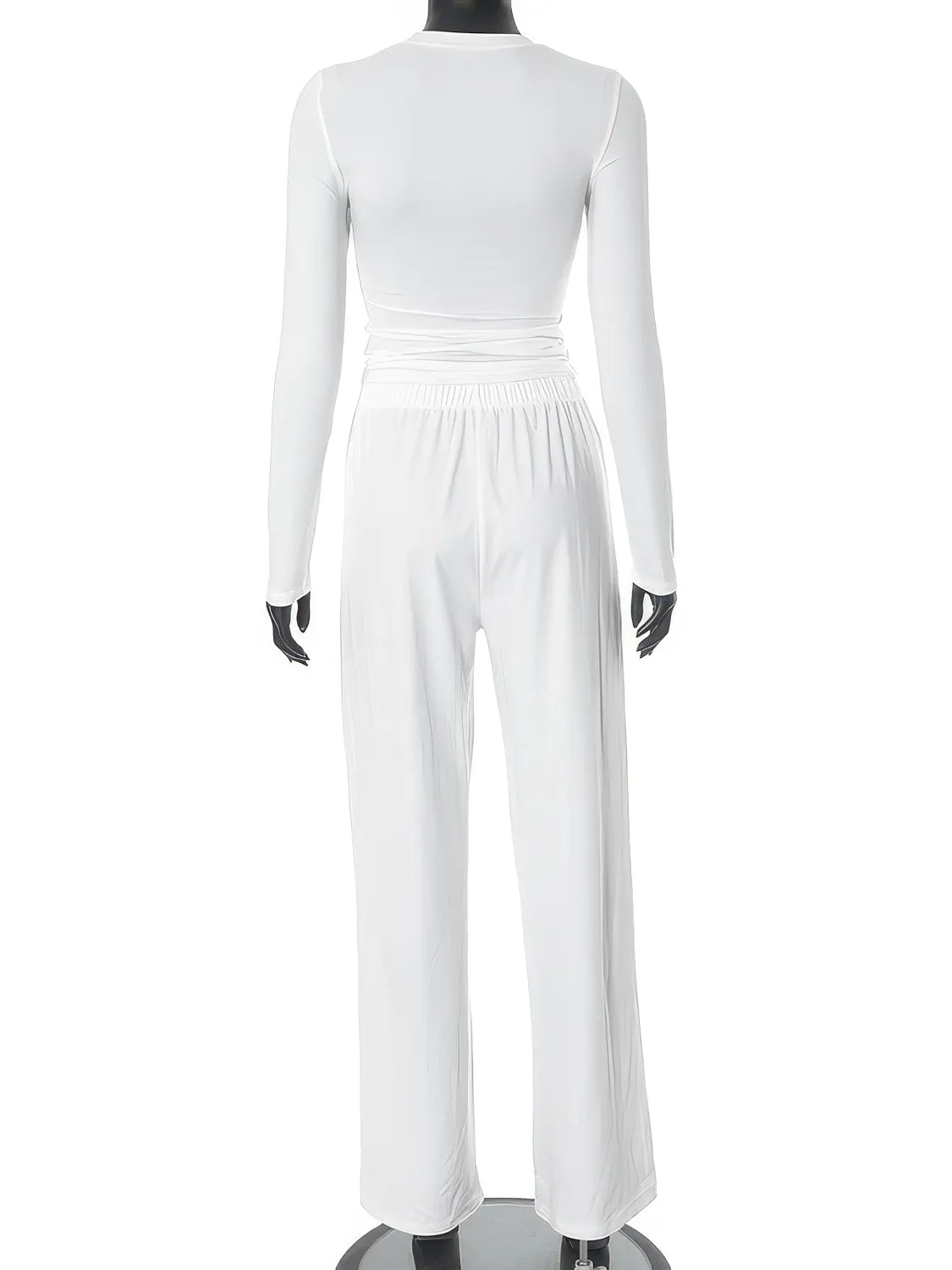 White jumpsuit on a mannequin against a white background. #Color_White