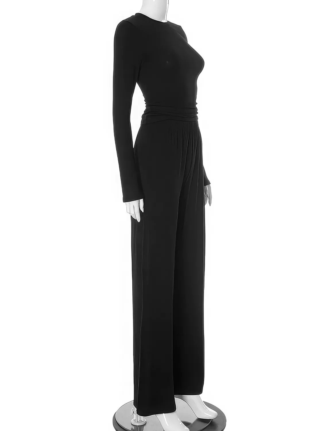 Black jumpsuit on a mannequin against a white background. #Color_Black