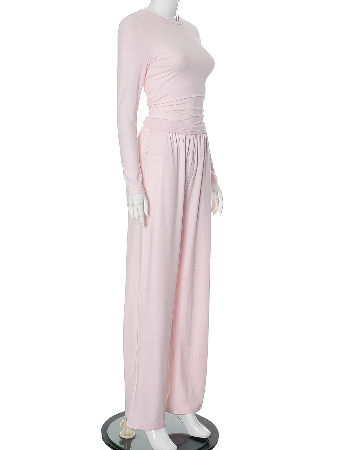 Mannequin wearing a light pink dress on a white background. #Color_Pink