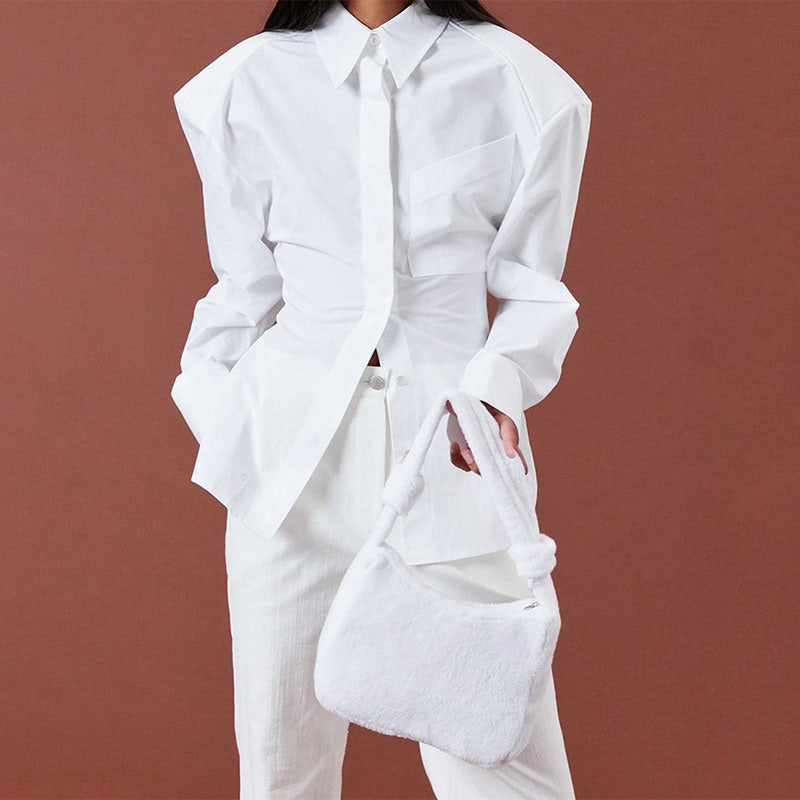 Women's backless shirt with shoulder pads